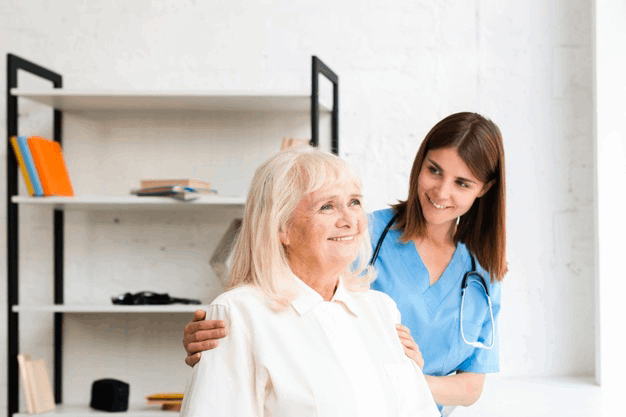 nurse-old-woman-looking-window_23-2148238989@1X